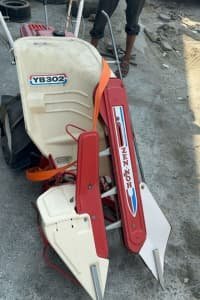 آلة الجز والتربيط ( reaper binder)